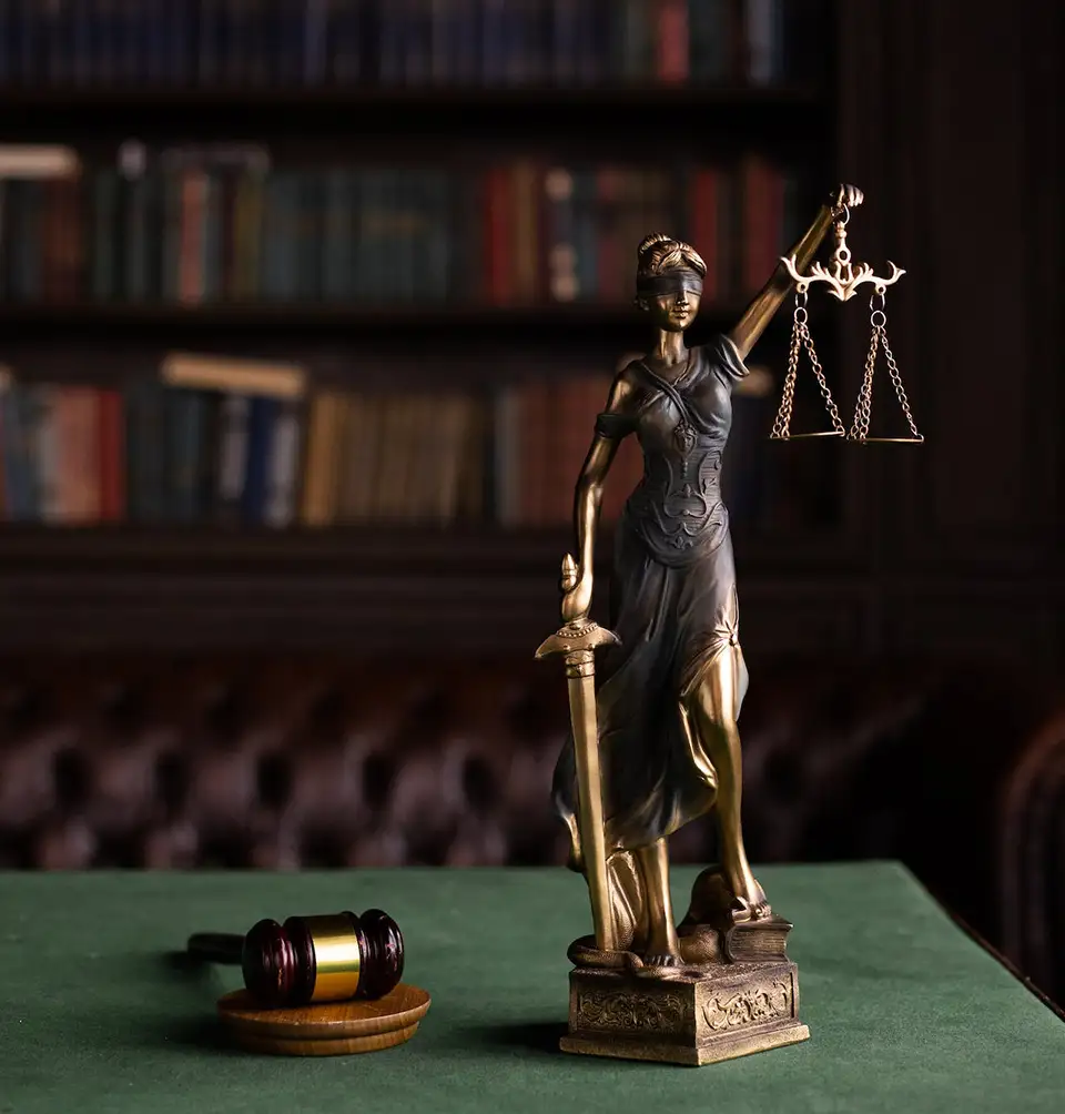 lady justice on desk